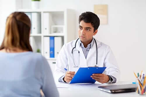 doctor discussing Methamphetamine Addiction Treatment with a client 